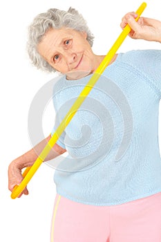 Senior woman gymnastic exercises with hoop