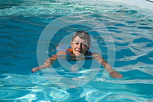Senior woman happy in the swimming pool