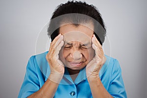 Senior woman have a headache