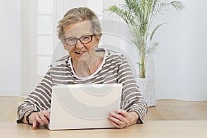 Senior Woman having fun on her computer