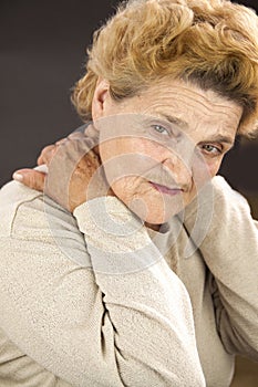 Senior woman having neck ache