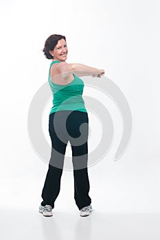 Senior woman in her 60s exercising to stay fit