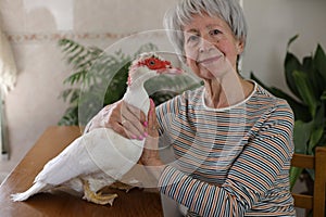 Senior woman and her duck