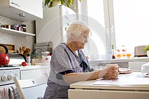 Senior woman in her kitchen
