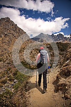 Senior woman hiking towards Humantay lake