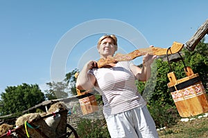 Senior woman holding retro yoke