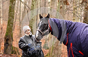 senior woman and horse