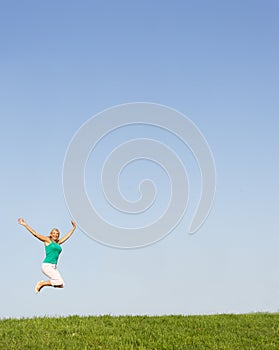 Senior woman jumping in air