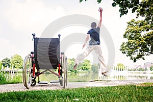 Senior Woman Jumping Up From Wheelchair