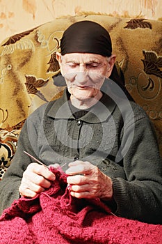 Senior woman at knitting