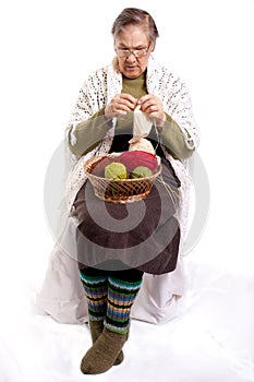 Senior woman knitting