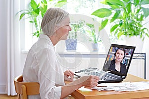 Senior woman laptop tax consultant