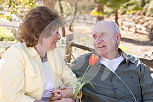 Senior Woman with Man Wearing Oxygen Tubes photo