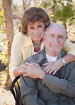 Senior Woman with Man Wearing Oxygen Tubes photo