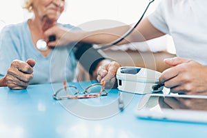 Senior woman during a medical exam with practitioner