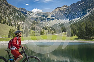 Senior woman on mountain bike