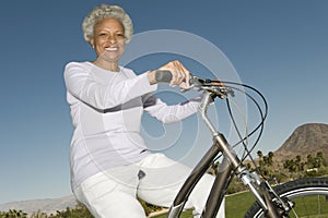 Senior Woman On Mountain Bike