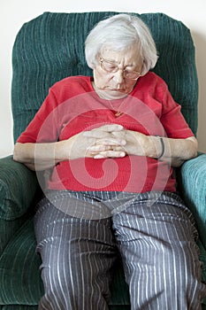 Senior woman napping