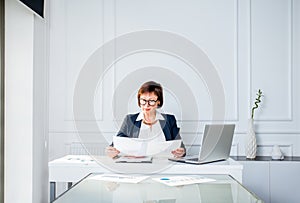 Senior woman at the office