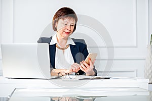 Senior woman at the office