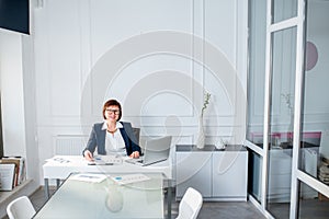 Senior woman at the office