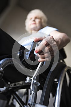 Senior Woman Operating Wheelchair