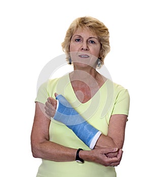 Senior woman with painful arm in cast