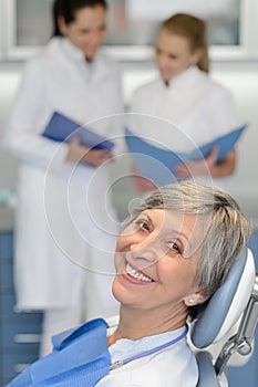 Senior woman patient at dentist surgery smiling