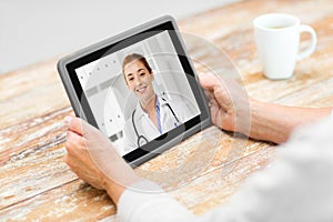 Senior woman patient having video call with doctor