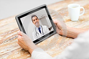 Senior woman patient having video call with doctor