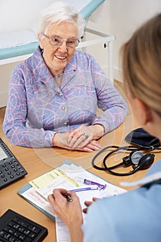 Senior woman patient with UK nurse