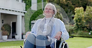 Senior woman, person with disability and thinking in garden, retirement home and alone. Wheelchair, healthcare and