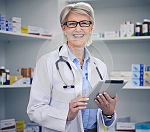 Senior woman, pharmacist and tablet portrait with medical stock and digital research. Pharmacy, healthcare store and