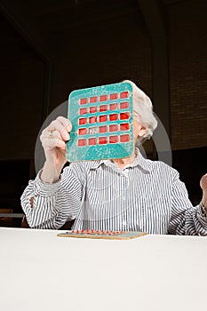 Senior woman playing bingo