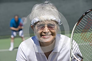 Senior Woman Playing Tennis