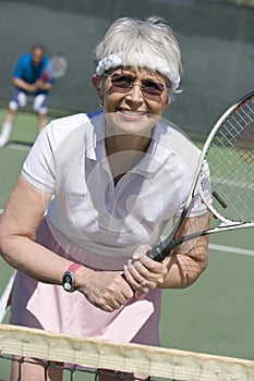 Senior Woman Playing Tennis