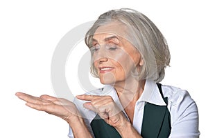 Senior woman pointing