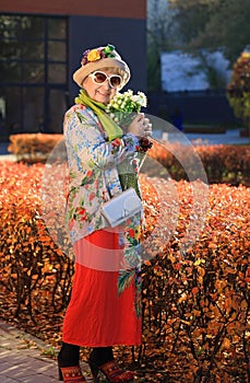 Senior woman portrait at sunny day