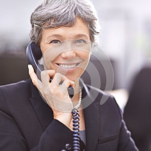 Senior woman, portrait and telemarketing phone call with communication and smile from work. Crm, telephone and support