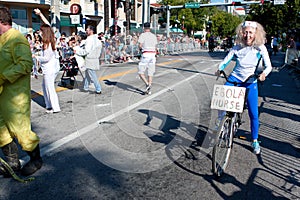 Senior Woman Poses As Ebola Nurse In Oddball Miami Parade