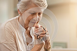 Senior woman praying