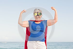 Senior woman pretending to be a superhero