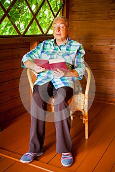 Senior woman reading a book