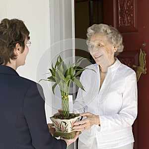 Senior woman receiving gift