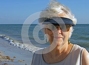 Senior woman relaxing on beach