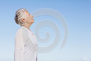 Senior woman relaxing on the beach