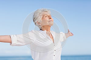 Senior woman relaxing on the beach