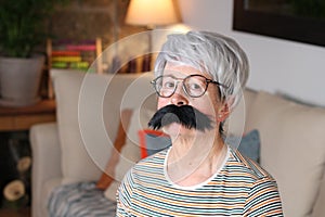 Senior woman with retro mustache