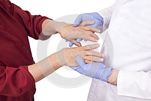 Senior woman with Rheumatoid arthritis visit a doctor photo