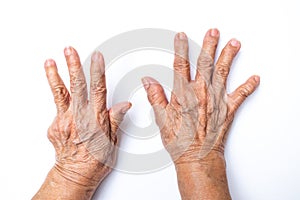 Senior woman`s hands  counting 9  on white background, Numbers 1-10 in sign language concept